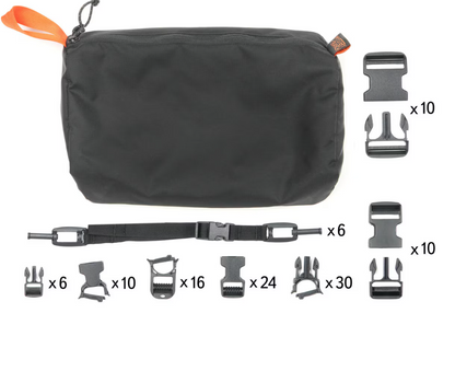 Black zippered Mystery Ranch pouch with various hardware components on a white background